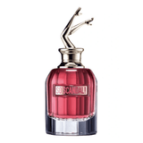 Jean Paul Gaultier So Scandal! Eau de Parfum 80ml bottle with sculpted gold legs cap, showcasing bold pink fragrance in luxury glass design.