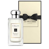 Jo Malone Grapefruit Cologne 100ml bottle displayed with its signature cream and black gift box, tied with a black ribbon for elegant presentation.