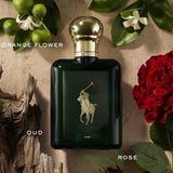 Ralph Lauren Polo Oud Eau de Parfum 125ml surrounded by key notes of orange flower, oud, and rose, highlighting its intense woody-amber profile.