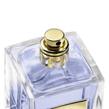 Close-up of Armani Privé Figuier Eden Eau de Toilette spray nozzle, highlighting the elegant gold atomizer and lavender-hued fragrance.