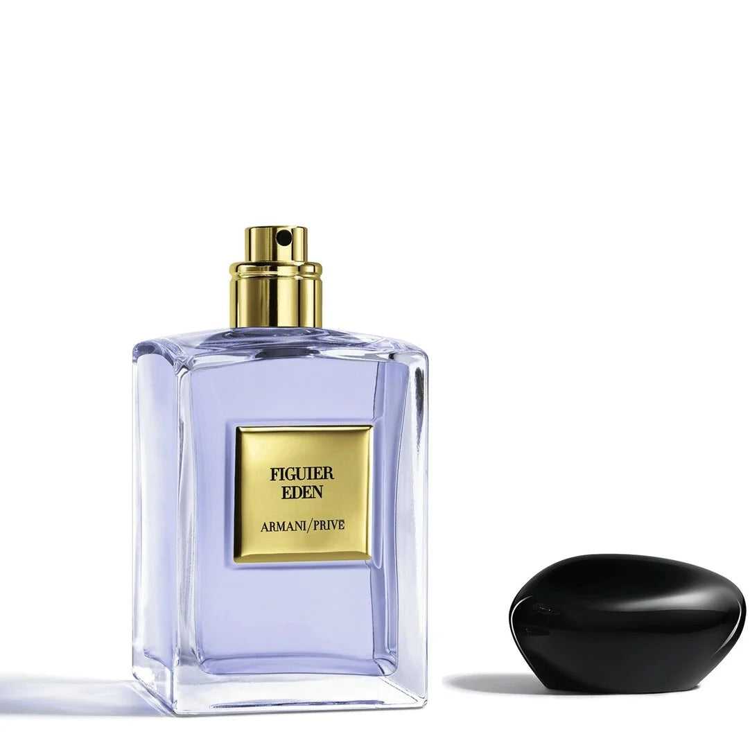 Armani Privé Figuier Eden Eau de Toilette 100ml with cap removed, revealing the sleek gold spray top and premium glass bottle design.