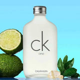 Calvin Klein CK One Eau de Toilette 100ml bottle with lime, green leaves, and resin, highlighting its fresh citrus and green tea notes.